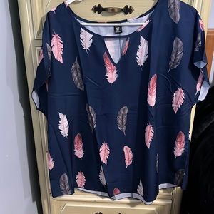 Women’s feather shirt